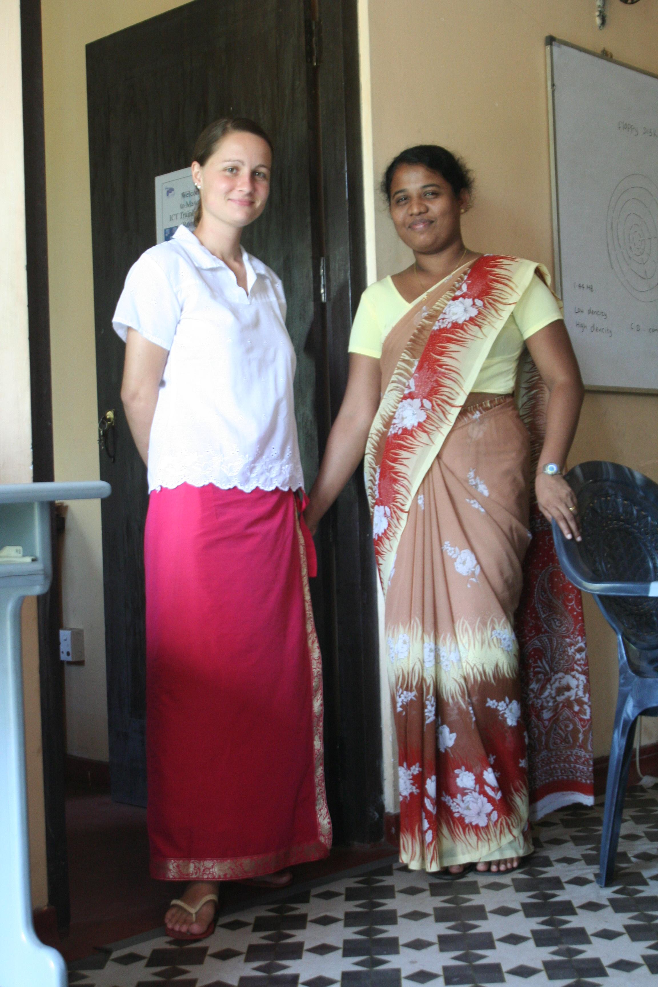 An intern gains business work experience at her placement in Sri Lanka. A Projects Abroad student on the business internship in Sri Lanka takes a photo with her supervisor.